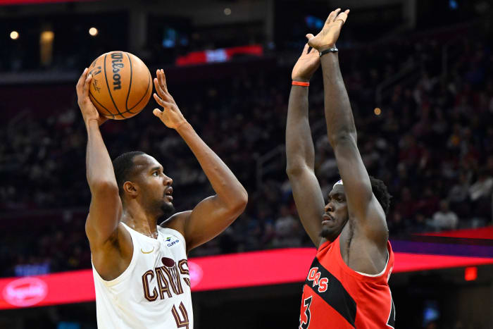 Nov 26, 2023; Cleveland, Ohio, USA; Cleveland Cavaliers forward Evan Mobley (4) shoots while guarded by Toronto Raptors forward Pascal Siakam (43) in the second quarter at Rocket Mortgage FieldHouse.